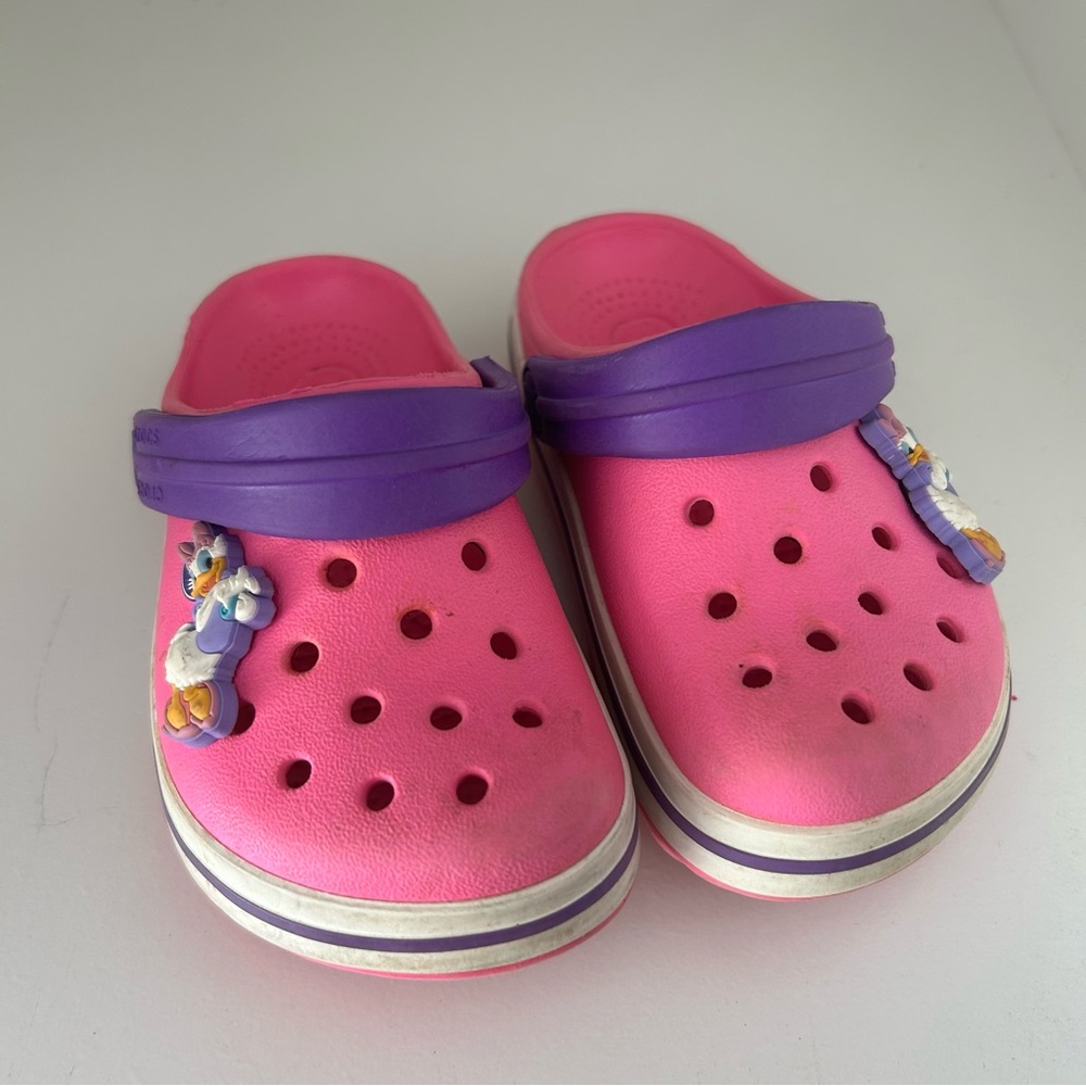 Pink and Purple Crocs, size 6/7, Daisy Duck jibbitz